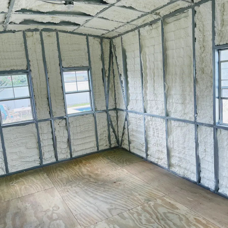 Closed-cell spray foam insulation applied to wall cavities in a residential project in Coatesville